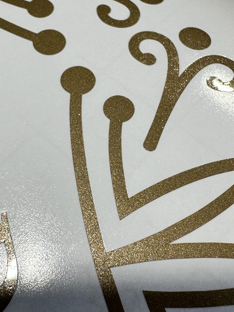 Detail van goudfolie belettering